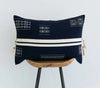 Montagu Bolster Cushion in Midnight and Ivory